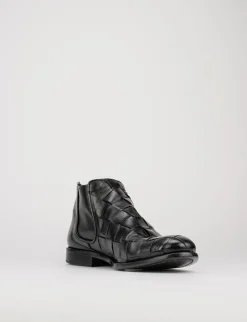 stivale tronchetto fondo cuoio e soletto interno in vera pelle. tomaia in morbida pelle nero