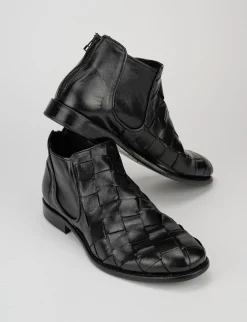 stivale tronchetto fondo cuoio e soletto interno in vera pelle. tomaia in morbida pelle nero