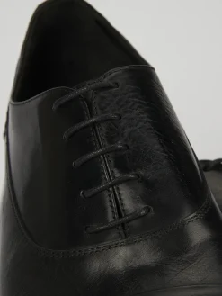 Stringata tacco 1 cm nero pelle