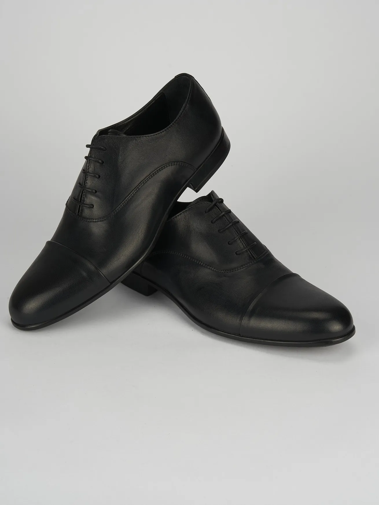 Stringata tacco 1 cm nero pelle