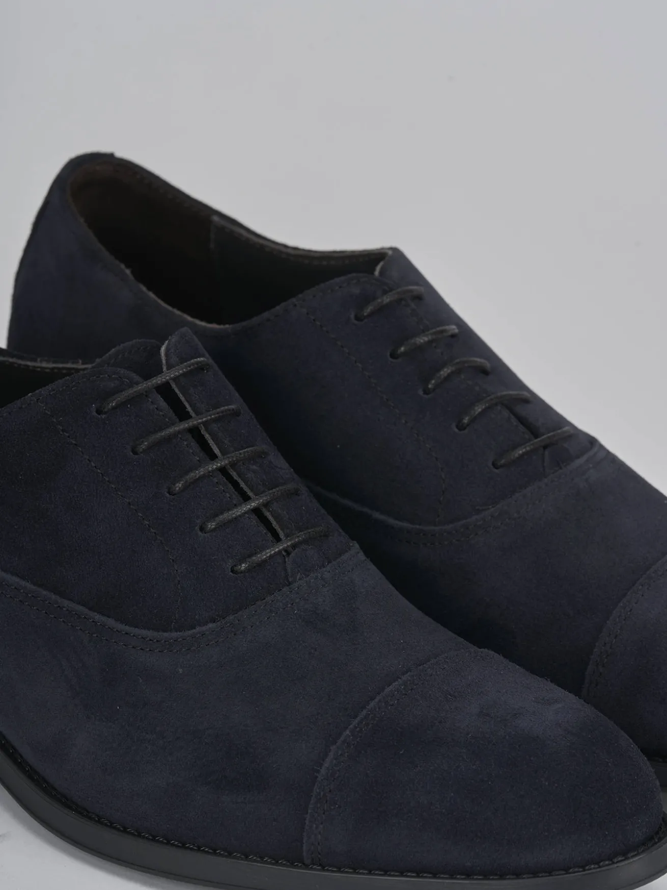 Stringate camoscio blu