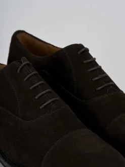 Stringate camoscio testa