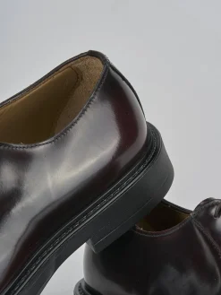 Stringate pelle bordo'