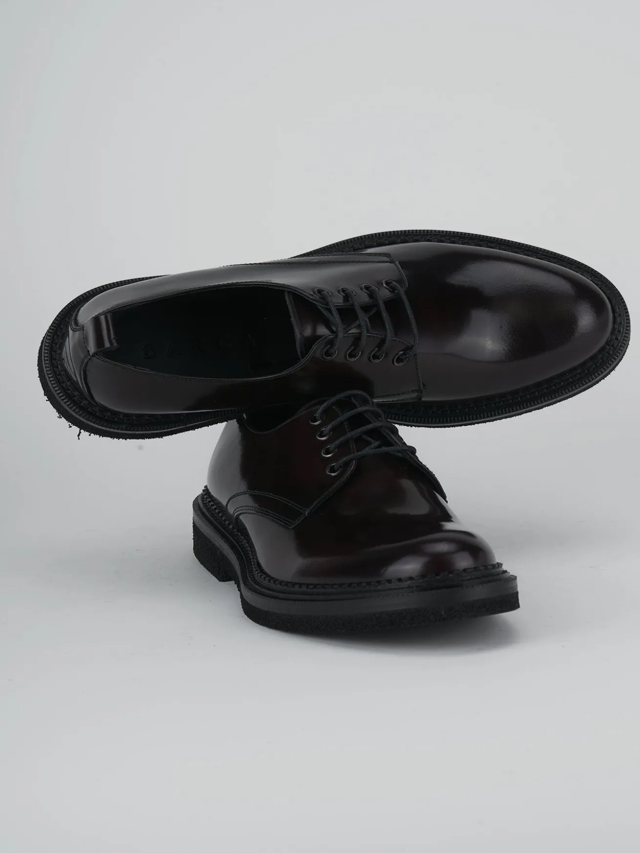 Stringate pelle bordo'