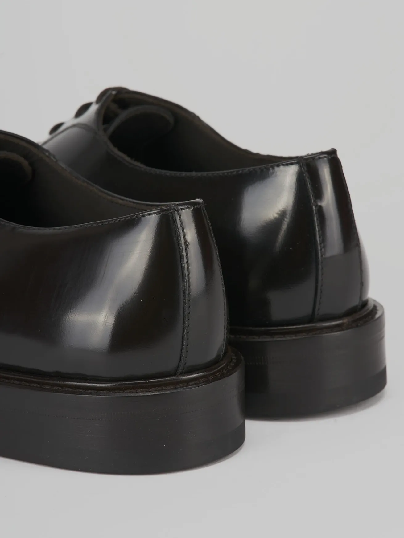 Stringate pelle testa