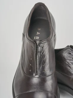 Stringate pelle testa