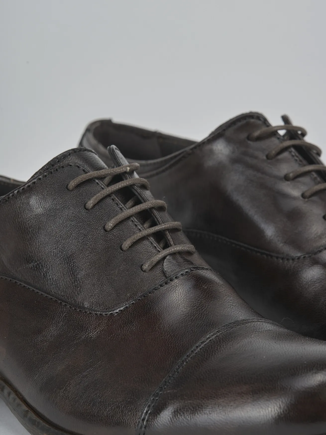 Stringate pelle testa