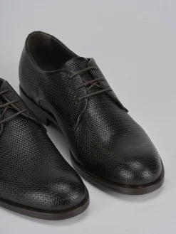 Stringate pelle testa