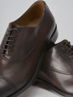 Stringate pelle testa