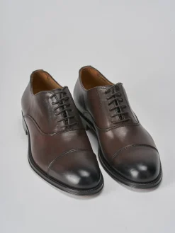 Stringate pelle testa