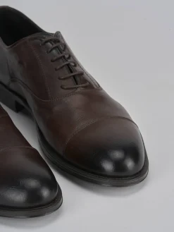 Stringate pelle testa