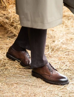 Stringate pelle testa