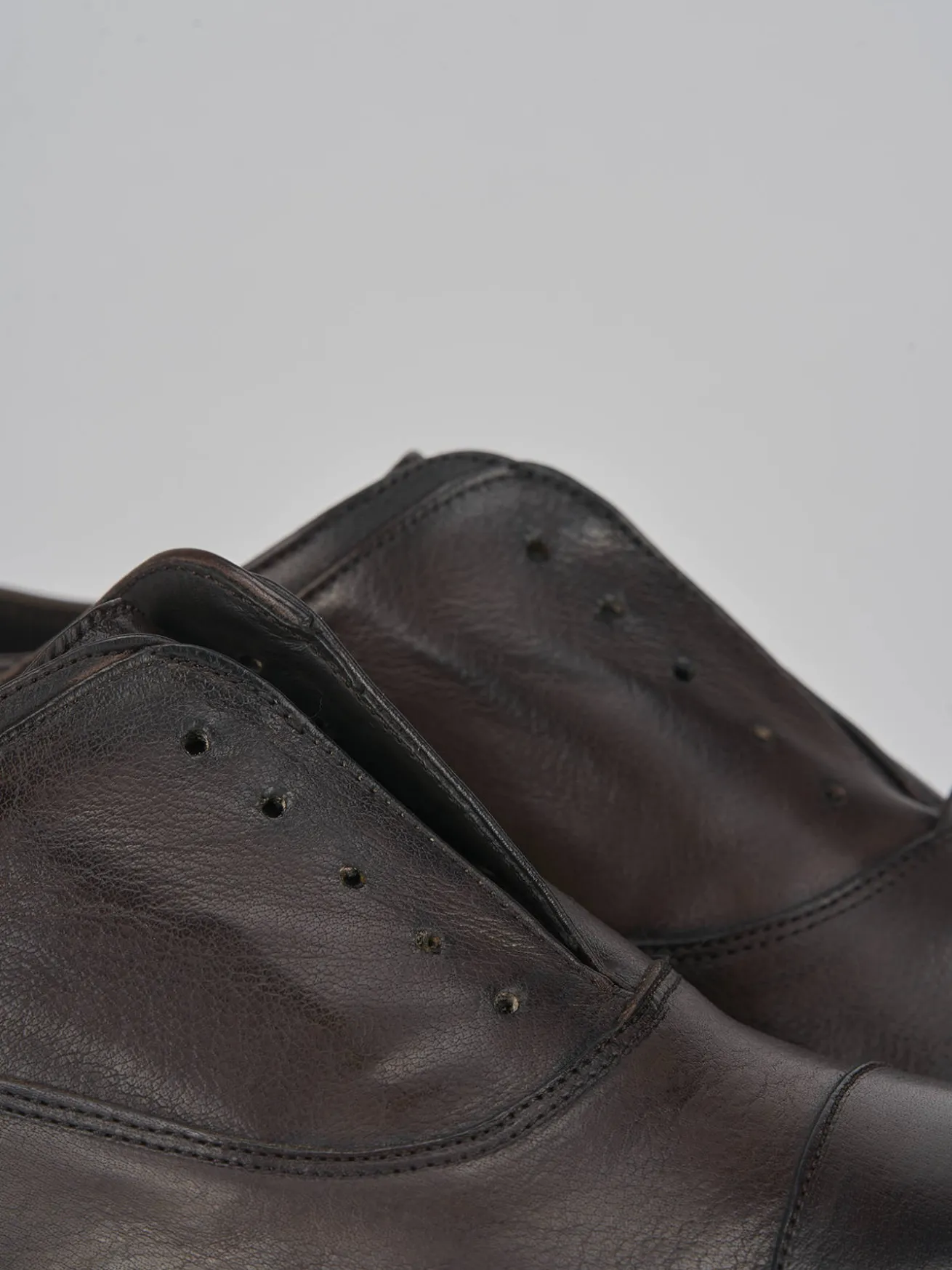 Stringate pelle testa