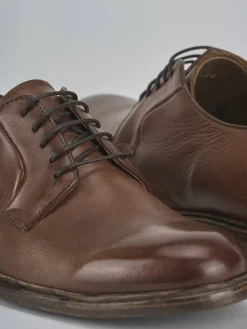 Stringate pelle testa