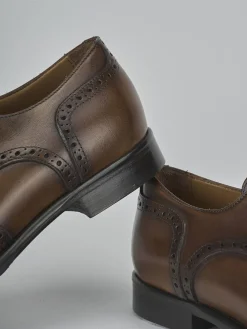 Stringate pelle testa