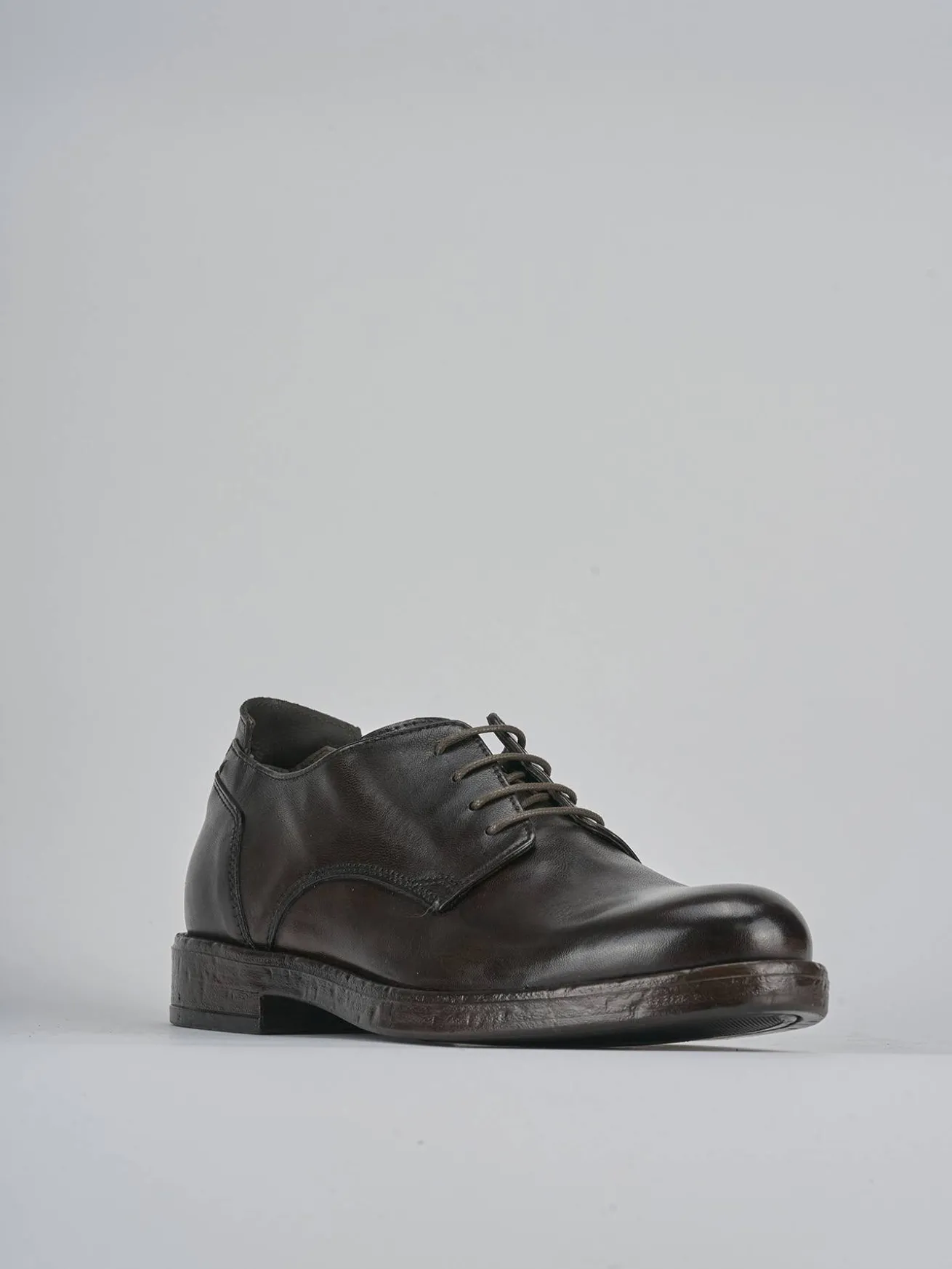 Stringate pelle testa