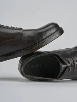 Stringate pelle testa