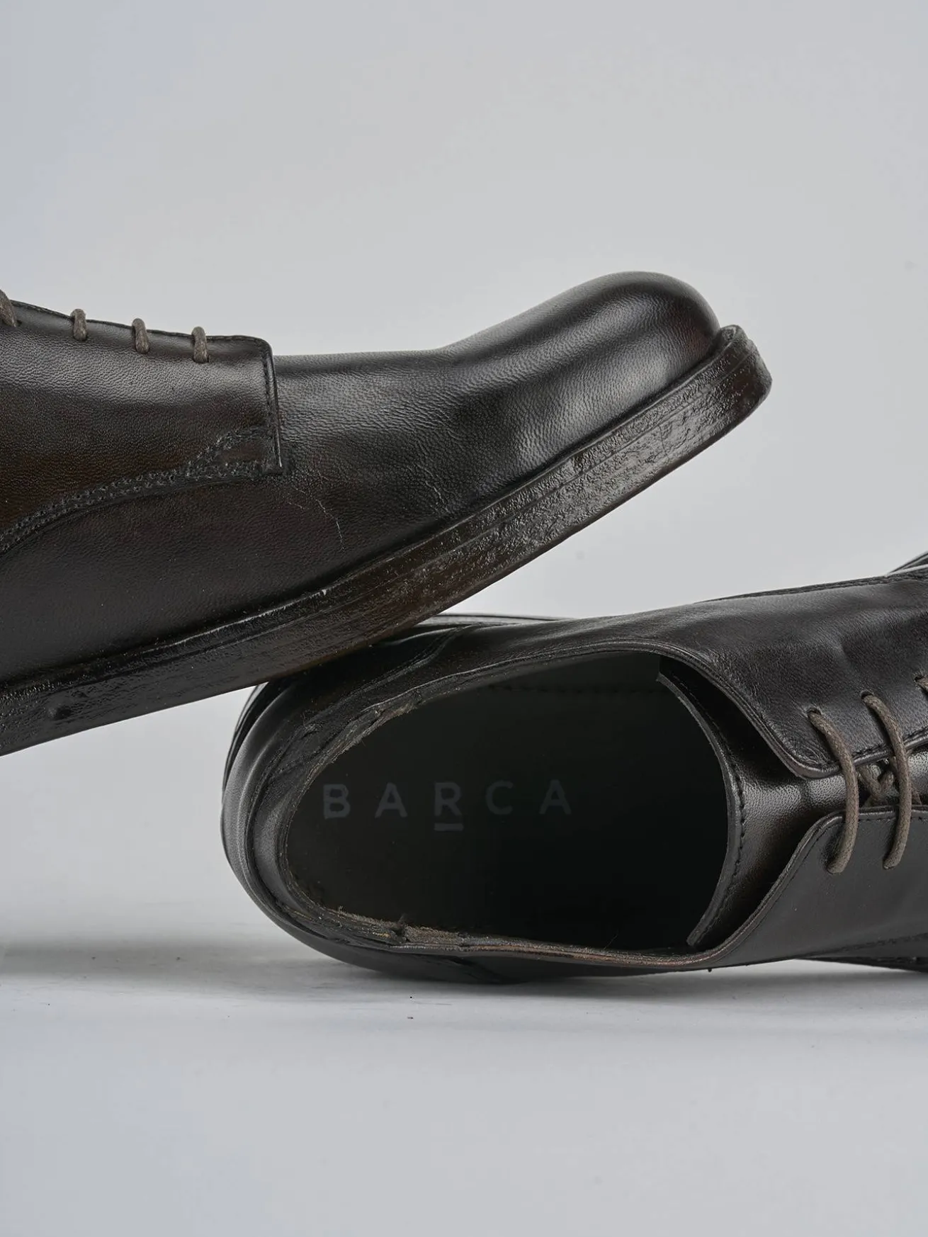 Stringate pelle testa